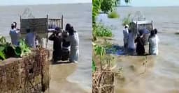 নদীভাঙনে দুর্ভোগ, কোমরসমান পানি মাড়িয়ে মুদি দোকানির শেষ বিদায়