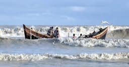 উত্তাল সাগরে তলিয়ে গেল দুই ট্রলার: উদ্ধার ১৬ জেলে, নিখোঁজ ২