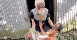 স্ত্রীকে কোলে নিয়ে বৃদ্ধের কান্না, ‘আল্লাহ আমাকে খাবার দাও’