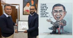 তারেক রহমানকে ‘আই হ্যাভ অ্যা প্ল্যান’ শীর্ষক কার্টুন হস্তান্তর