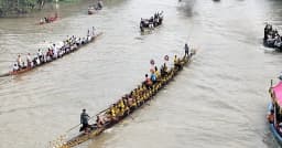 নগরকান্দায় নৌকাবাইচ দেখতে হাজারো মানুষের ঢল