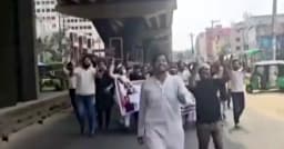 কাফনের কাপড় মাথায় বেঁধে নিষিদ্ধ চট্টগ্রামে যুবলীগের মিছিল