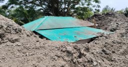 নদী খননের মাটি এখন আশ্রয়ণ বাসিন্দাদের ‘গলার কাঁটা’