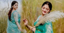কাশফুলের কোমল ছোঁয়ায় শরতের সাজে পূজা চেরী