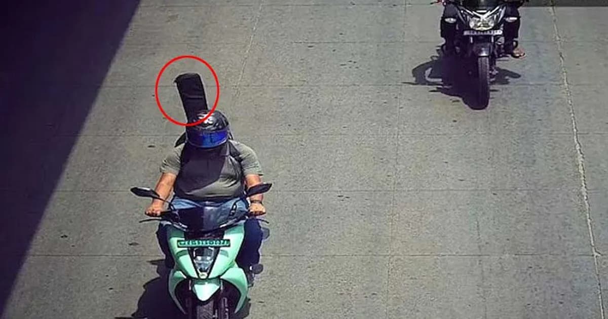 এআই ক্যামেরার কাণ্ড, গিটারকে হেলমেটবিহীন যাত্রী ভেবে মামলা