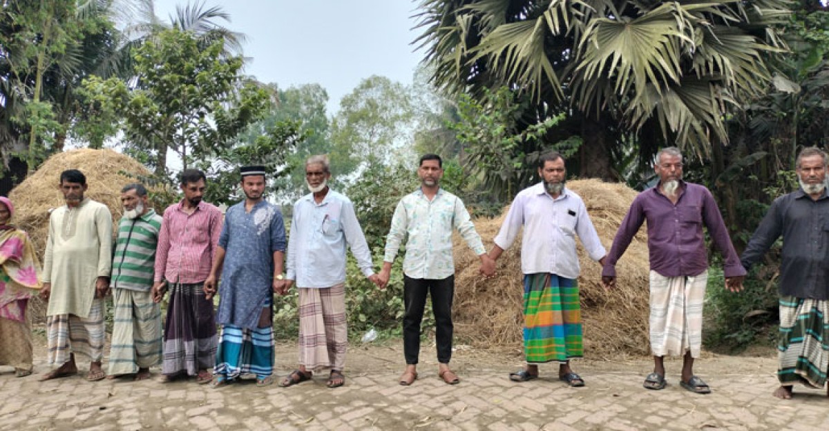 ধামরাইয়ে মিথ্যা মামলা প্রত্যাহারের দাবিতে মানববন্ধন