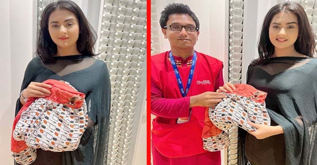 বঙ্গবাজারে পুড়ে যাওয়া কাপড় কিনলেন বুবলী
